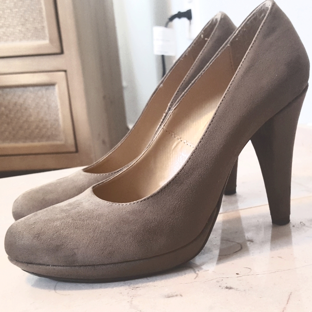 Size 37 (6.5 US) faux seude heels purchased in Europe.